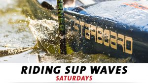 Riding SUP waves course